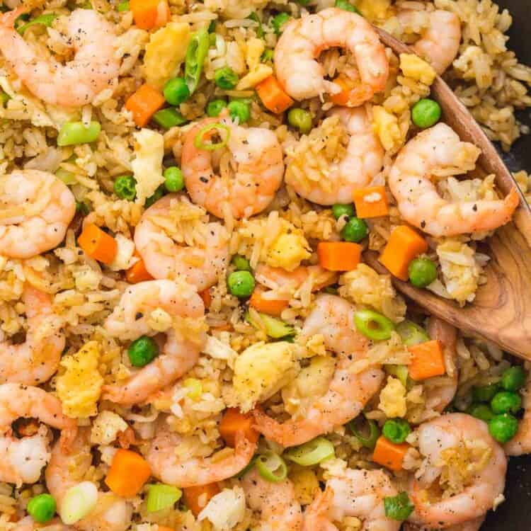 Overhead shot of shrimp fried rice in a cast iron Staub skillet